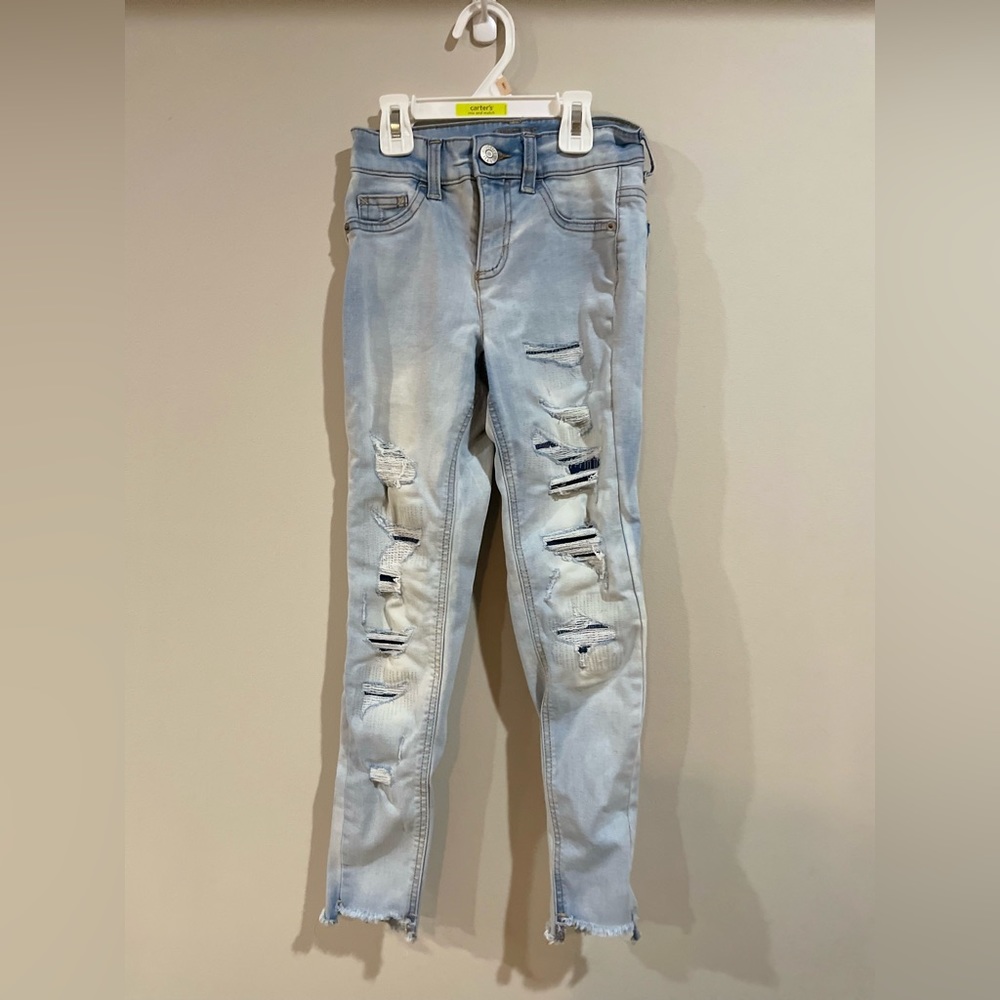 Justice jeans, holes are patched, slim
